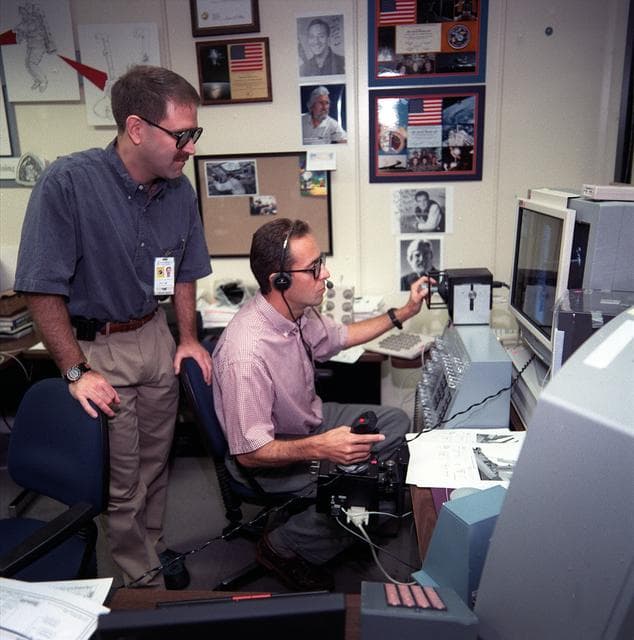 NASA image: STS-103 crew perform virtual reality training in building 9N
