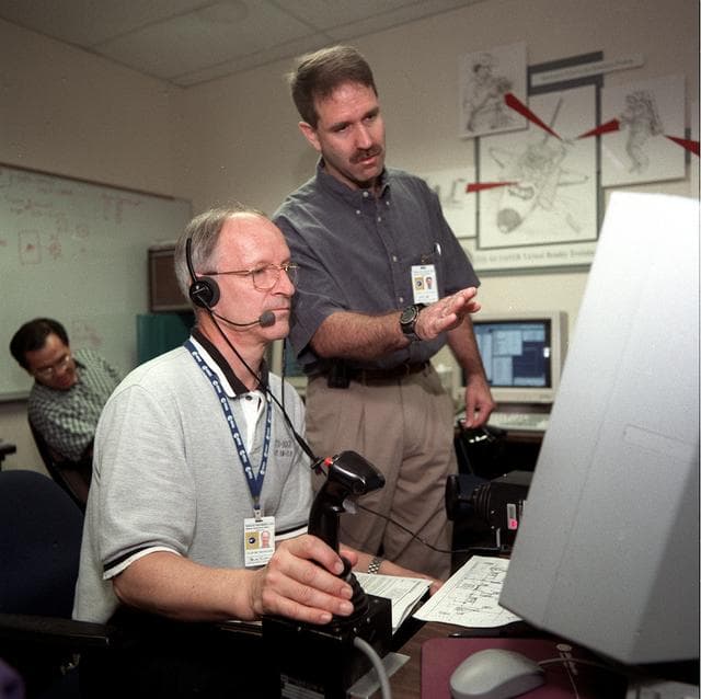 NASA image: STS-103 crew perform virtual reality training in building 9N