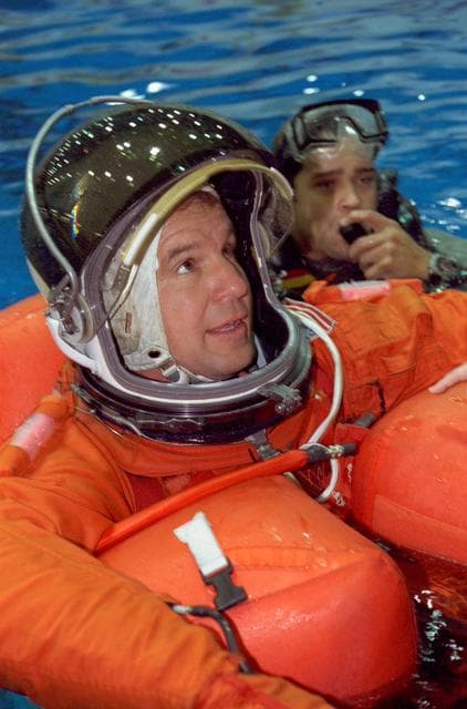 NASA image: STS-97 crewmembers participate in water survival training at NBL