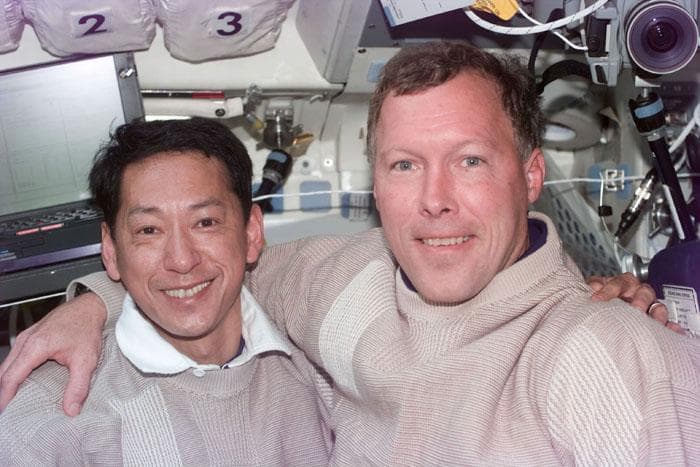 NASA image: STS-99 Mohri and Gorie pose for a photo on OV-105's flight deck
