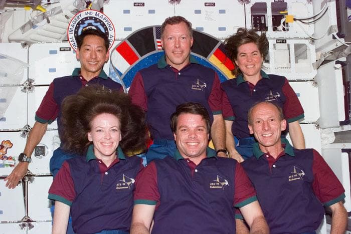 NASA image: STS-99 crewmembers pose for inflight portrait on OV-105's middeck