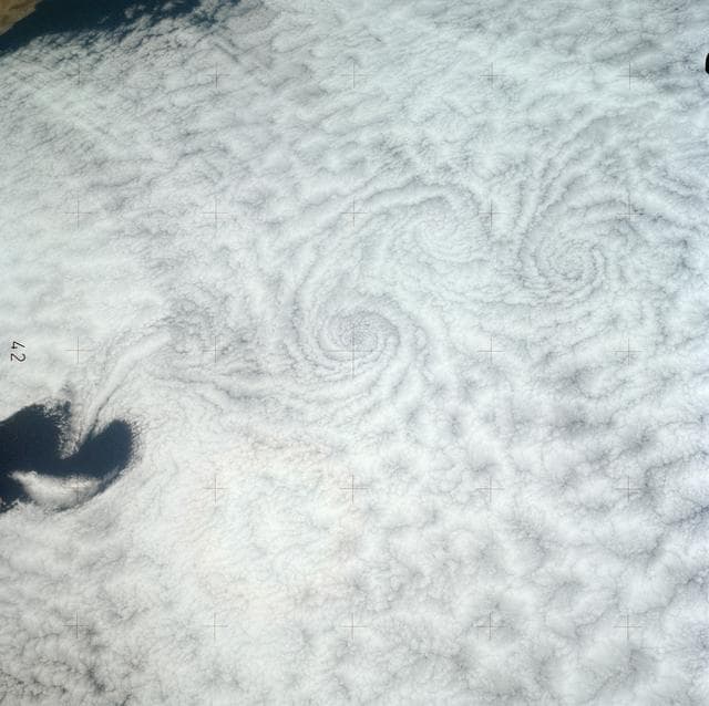 NASA image: Pattern of downstream eddies in stratocumulus clouds over Pacific Ocean