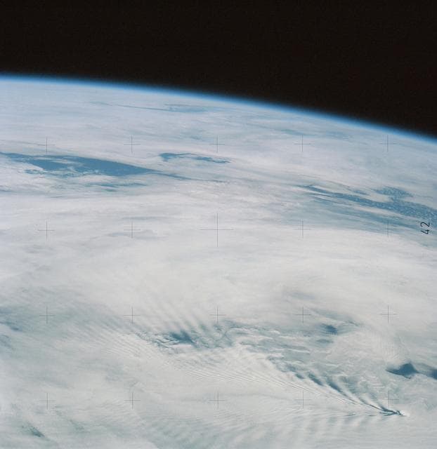 NASA image: View of atmospheric wave patterns by effect of island on wind currents