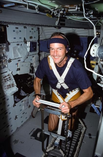 NASA image: STS-43 Mission Specialist (MS) Low exercises on OV-104's middeck treadmill