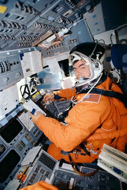 NASA image: STS-46 Pilot Allen, in LES, at pilots station on OV-104's forward flight deck