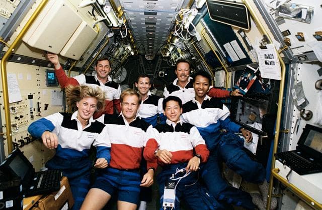 NASA image: STS-47 crew poses for official onboard (in space) portrait in SLJ module