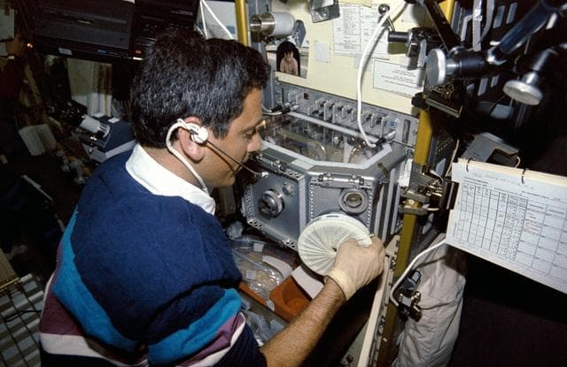 NASA image: Crewmember in the spacelab.
