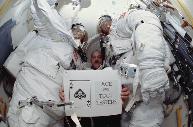 NASA image: Astronauts Readdy, Walz, and Newman in airlock after EVA