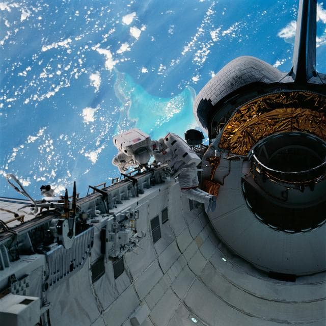 NASA image: Astronauts Newman and Walz evaluate tools for use on HST servicing mission