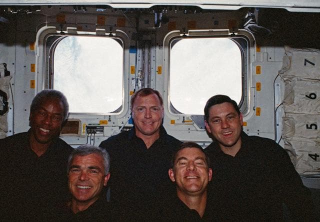 NASA image: In orbit crew group portrait in the aft flight deck.