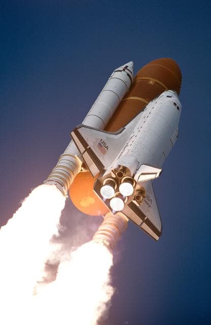 NASA image: STS-53 Discovery, Orbiter Vehicle (OV) 103, rises into sky after KSC liftoff