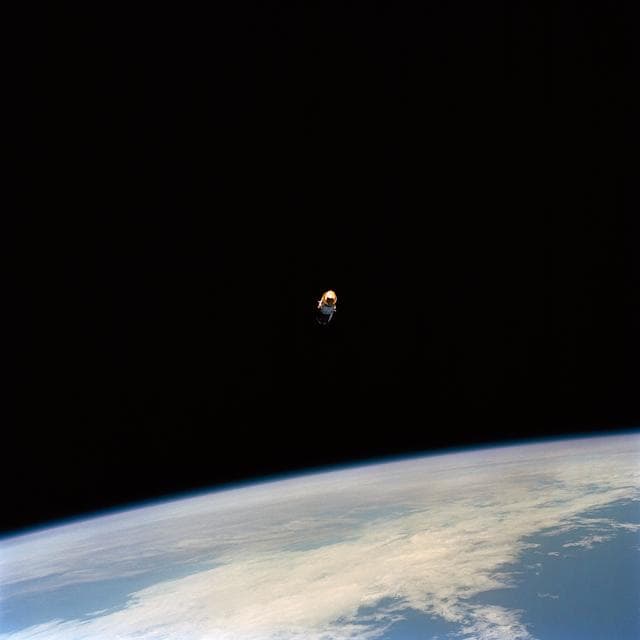 NASA image: IUS / TDRS-F drifts above the Earth's surface after STS-54 deployment