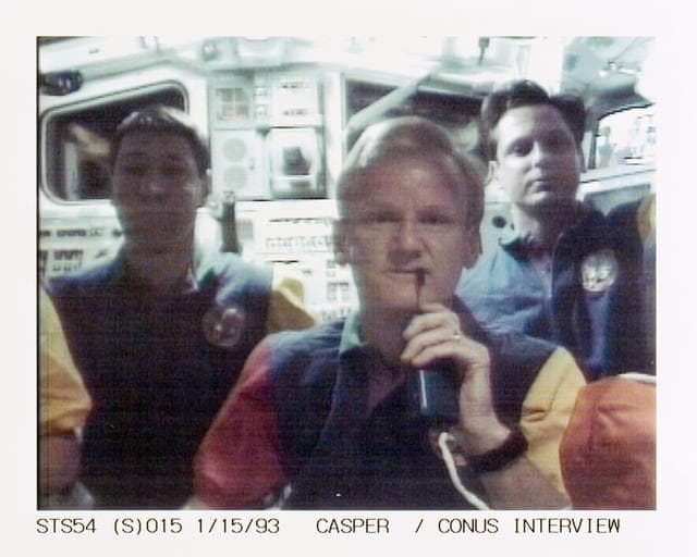 NASA image: STS-54 Commander Casper talks to radio station from OV-105's aft flight deck