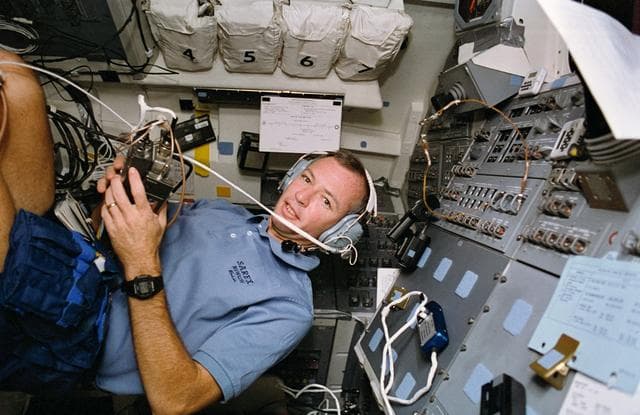 NASA image: STS-57 Pilot Brian J. Duffy uses SAREX II on the aft flight deck of OV-105