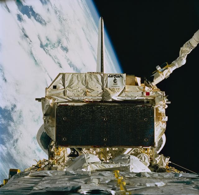 NASA image: STS-57 remote manipulator system (RMS) grapples EURECA over OV-105's PLB