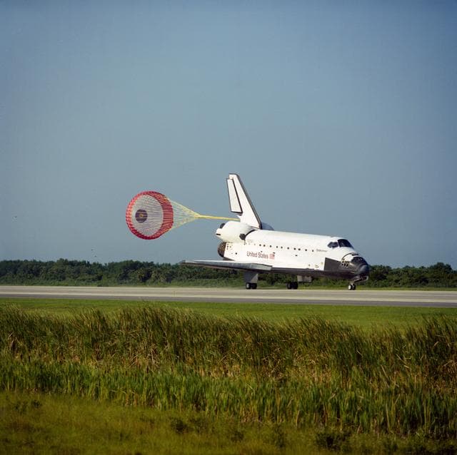 NASA image: STS-57 Endeavour, OV-105, with drag chute deployed lands on KSC SLF runway 33