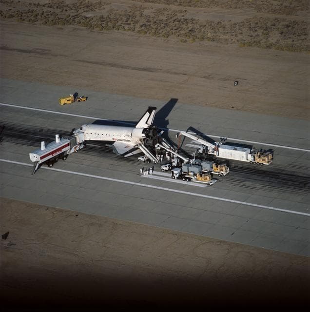 NASA image: STS-58 post landing scene as orbiter is serviced