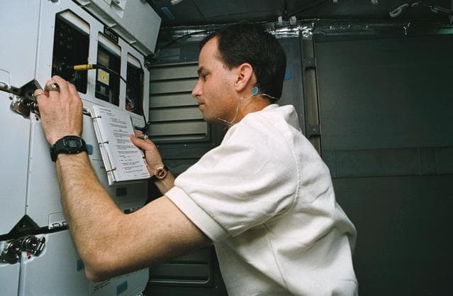 NASA image: Astronaut Kevin Chilton works with advanced cell reactor