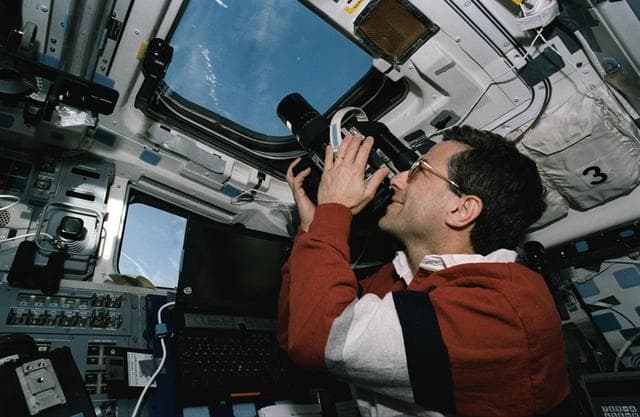 NASA image: Astronaut Jay Apt uses Hasselblad camera to record earth observations