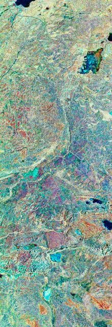 NASA image: Three frequency false-color image of Prince Albert, Canada