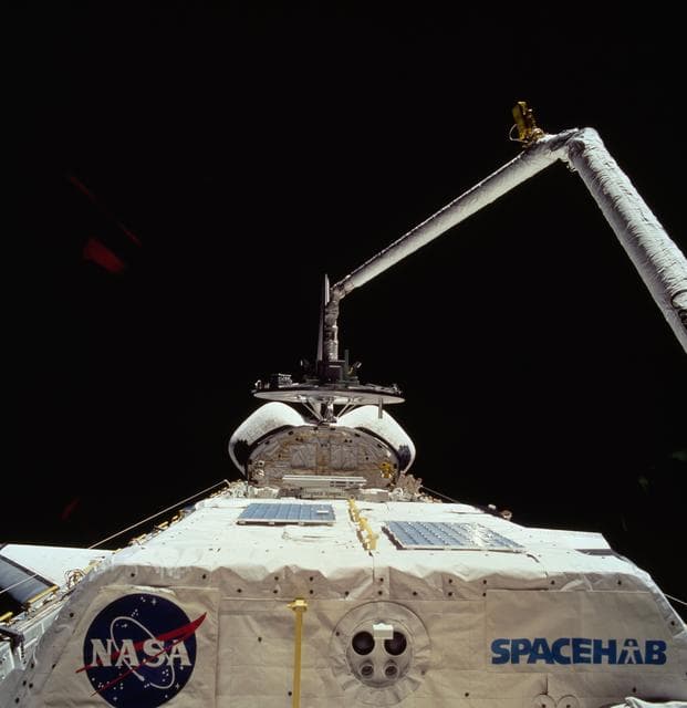 NASA image: Wake Shield Facility in grasp of the Remote Manipulator System