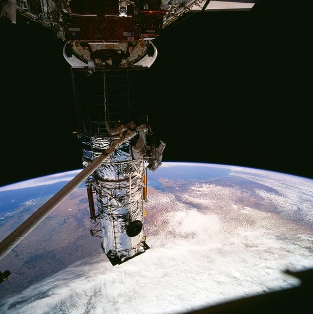 NASA image: Astronauts Hoffman and Musgrave replace Solar Array Drive Electronics