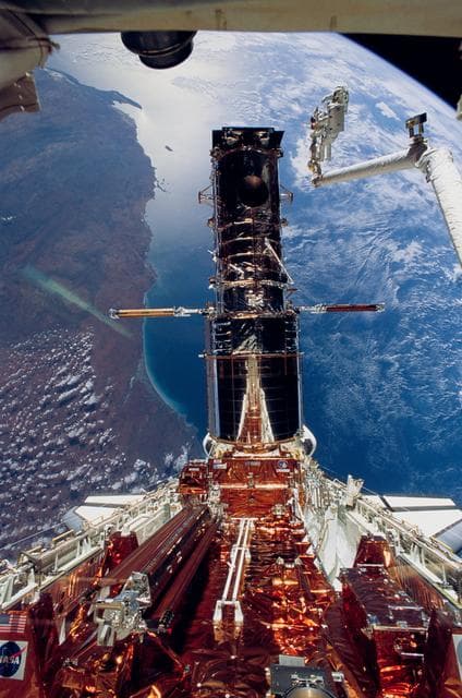 NASA image: Astronauts Musgrave and Hoffman during final STS-61 EVA