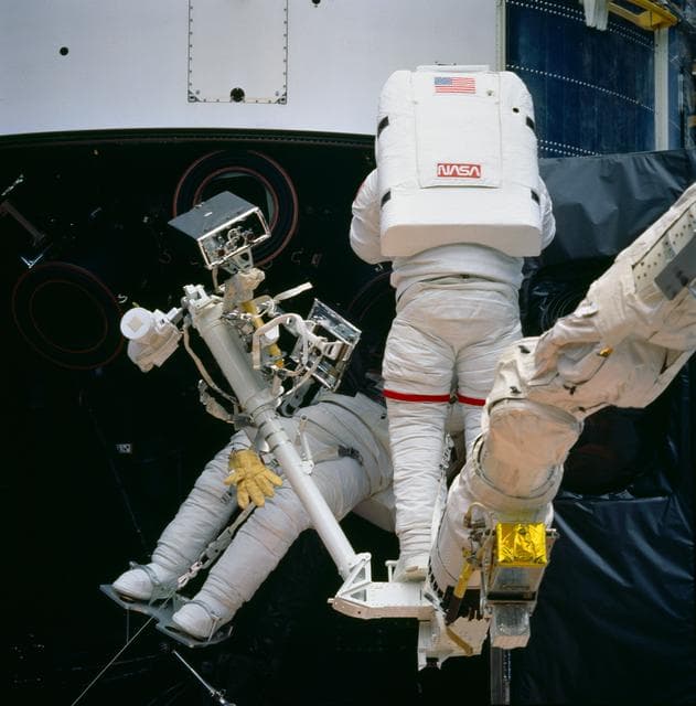 NASA image: Astronauts Musgrave and Hoffman during first STS-61 EVA