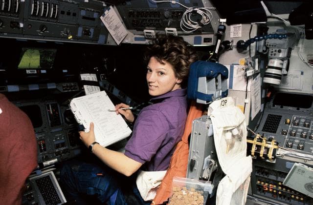 NASA image: Astronaut Eileen Collins at pilots station during "hotfiring" procedure