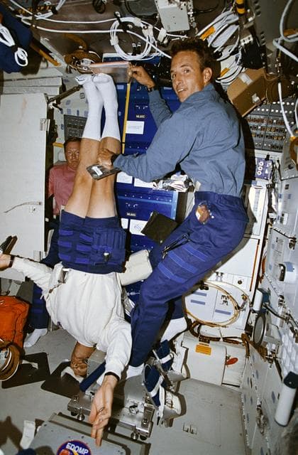 NASA image: Astronaut Mark Linenger measures height of Astronaut Mark Lee during DSO