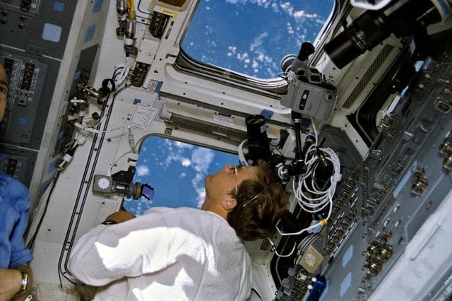 NASA image: Astronaut Mark Lee monitors LITE at work in cargo bay