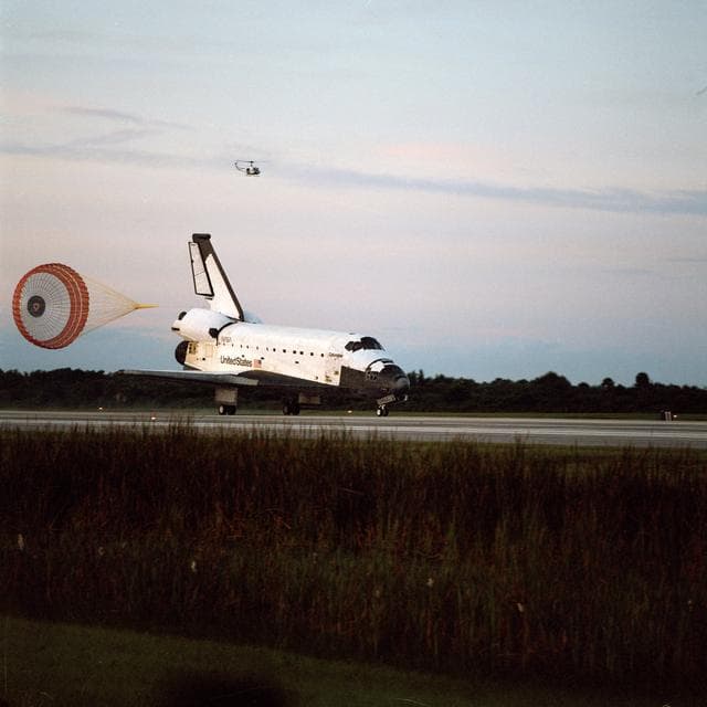 NASA image: STS-65 Columbia, OV-102, with drag chute deployed lands at KSC SLF