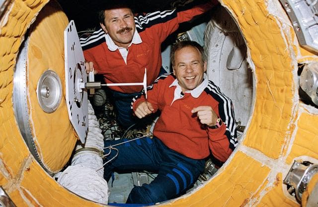 NASA image: Solovyev and Budarin prepare to close hatch to docking module