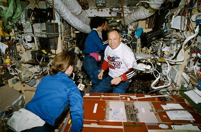 NASA image: Astronauts and cosmonauts in Mir core module