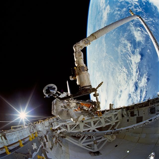 NASA image: Payload bay activity during first EVA of STS-72 mission