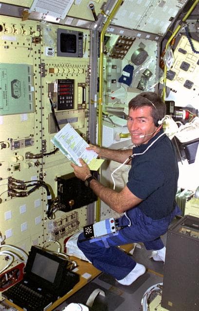 NASA image: STDCE, Payload Specialist Fred Leslie works at the STDCE rack in USML-2 Spacelab