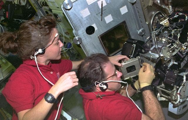 DPM, Payload Specialist Al Sacco and Payload Commander Kathy Thornton work at DPM