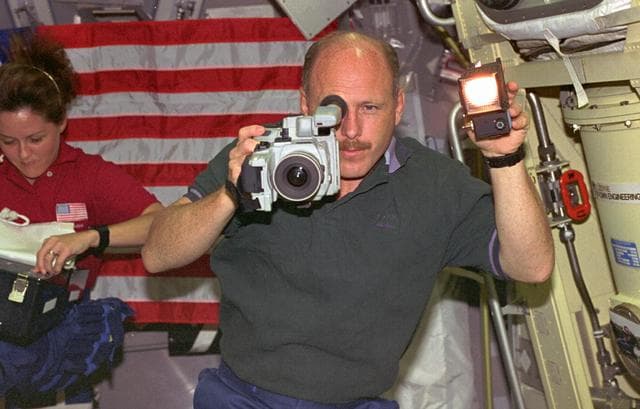 NASA image: Commander Ken Bowersox films activity in Spacelab