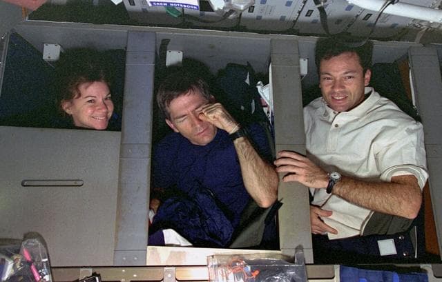 NASA image: Blue team wakes up and climbs out of sleep stations
