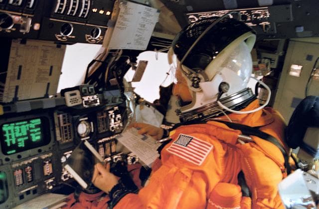 NASA image: Astronaut Horowitz at shuttle controls for reentry