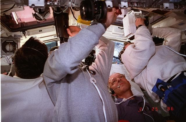 NASA image: STS-75 crew on aft flight deck during TSS-1R deployement