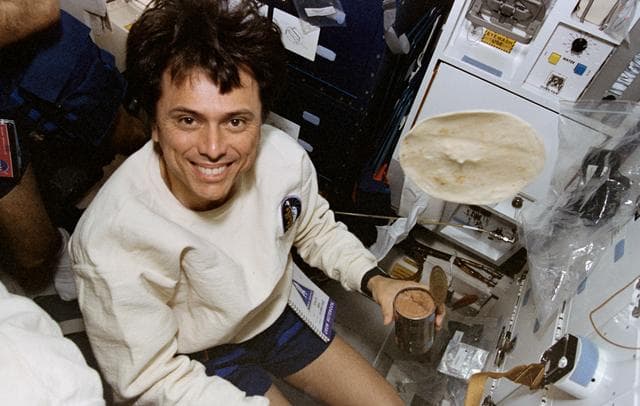 NASA image: Astronaut Chang-Diaz making burritos in space