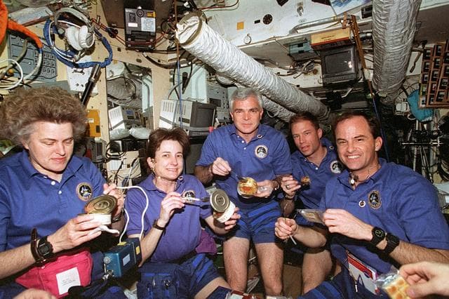 NASA image: Crew activity in Mir Space Station and Shuttle Atlantis