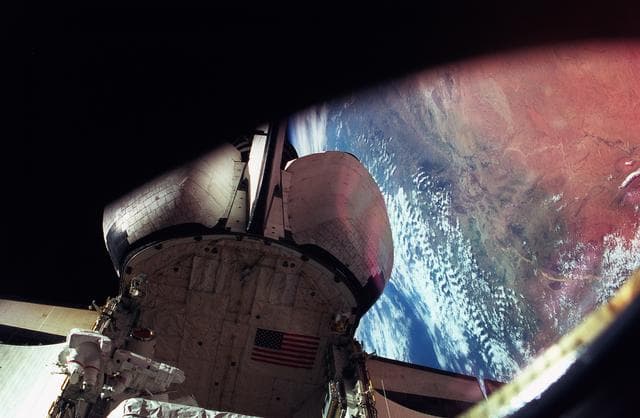 NASA image: Astronauts Linda Godwin and Michael "Rich" Clifford perform EVA