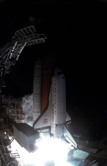NASA image: STS-76 Atlantis, OV (Orbiter Vehicle) 104, lifts off from KSC Pad 39B