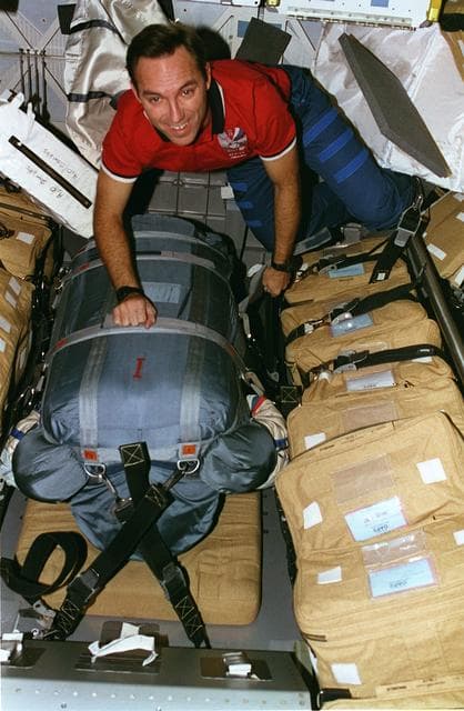 NASA image: Astronaut Walz with stowed Orlan space suit