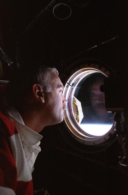 NASA image: Astronauts Apt and Readdy at Spacehab window