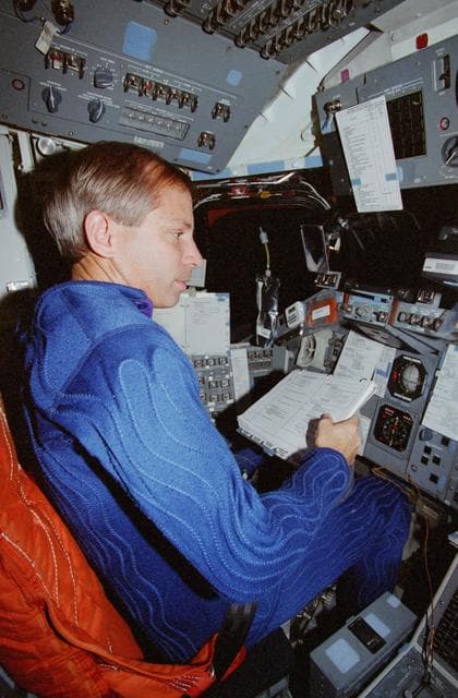 NASA image: Cockrell and Rominger go through de-orbit preparations in the flight deck