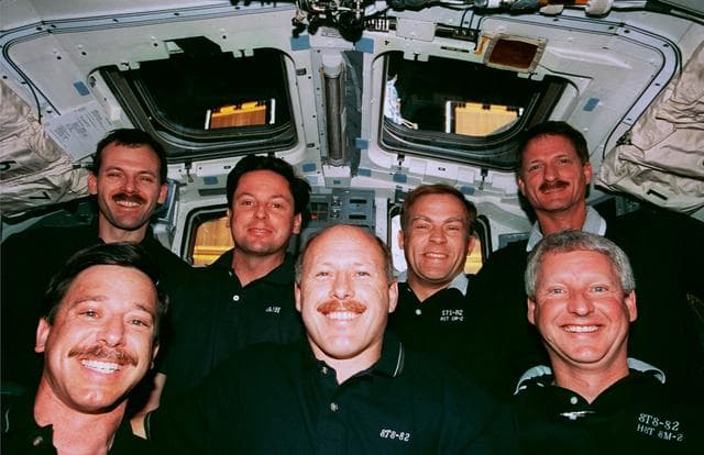 NASA image: Crew portrait in the orbiter flight deck