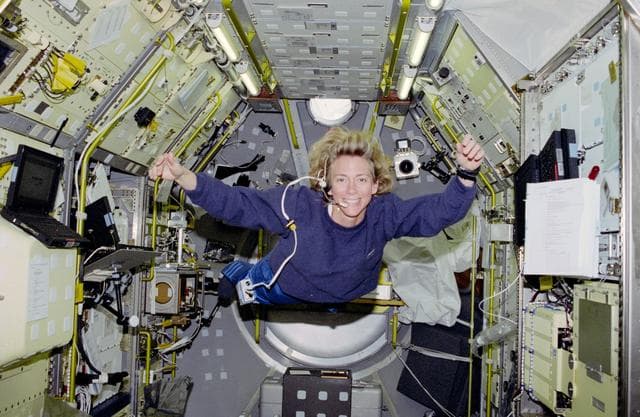 NASA image: Candid views of Pilot Still in the Spacelab module